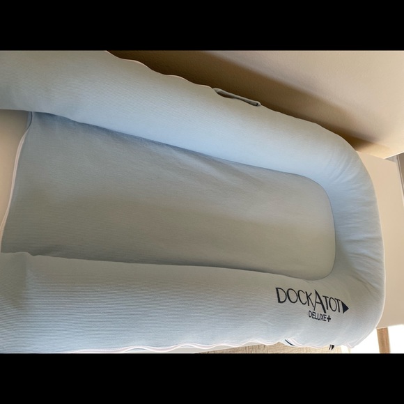 The DockATot Deluxe+ is multifunctional docking station for babies. Light blue. - Picture 7 of 7